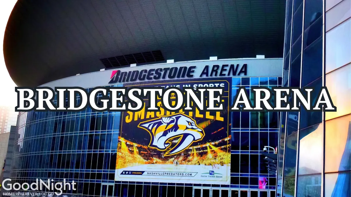 The bustling exterior of Bridgestone Arena, with its recognizable signage and banners, set against a backdrop of city life. The atmosphere is charged with anticipation for concerts, sports games, and major events.