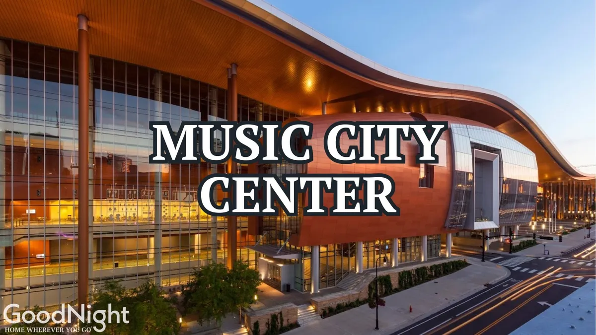 A striking exterior view of Music City Center, characterized by its modern architectural structure, large glass windows, and signature curved roof. The building is surrounded by urban landscapes and bustling city energy, emblematic of Nashville's downtown business district.